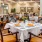 a dining room with tables set
