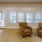 a room with chairs and a table