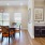 a dining room with a table and chairs