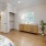 a bedroom with a bed and a desk