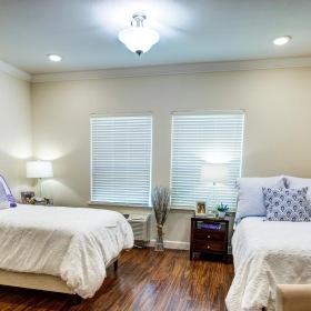Relax and recharge in beautiful and spacious bedrooms a bedroom with two beds
