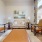 a living room with a couch and chairs
