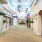 a long hallway with flags