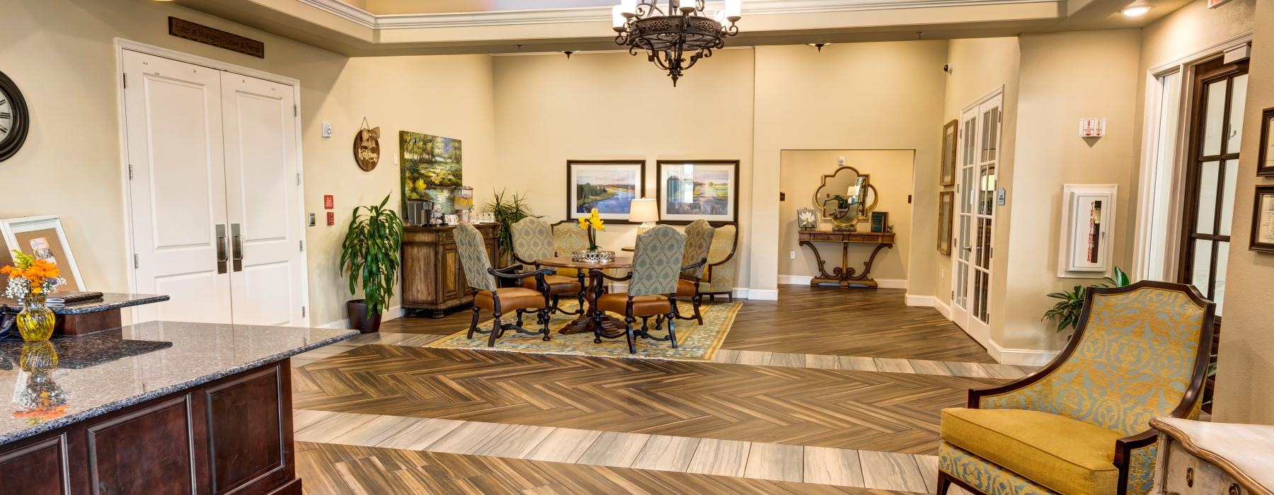 a large room with a dining table and chairs